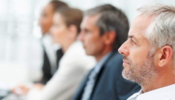 Börsenmanager während einer Konferenz © Yuri Arcurs, Fotolia
