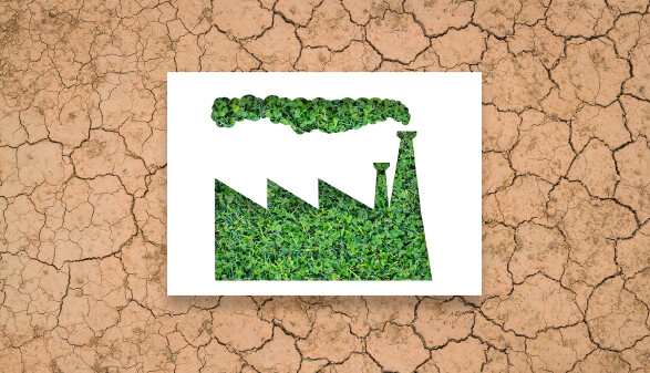 Green Washing: Blatt Papier mit dem Umriss einer Fabrik
