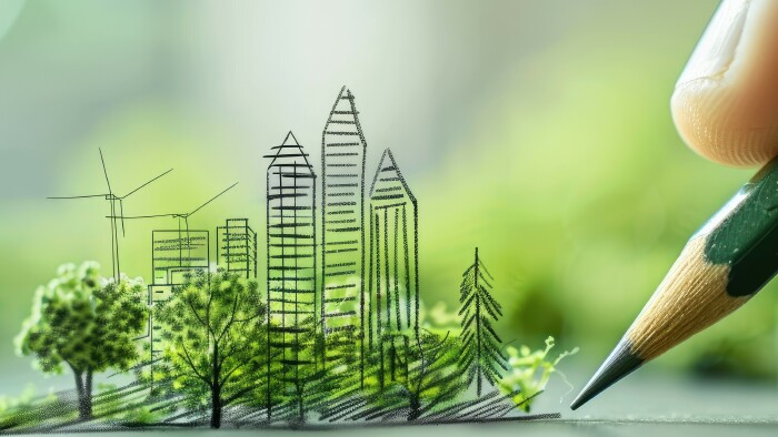 © Nhan, stock.adobe.com Hand drawing a concept of green energy and ecology with pencil on a natural background